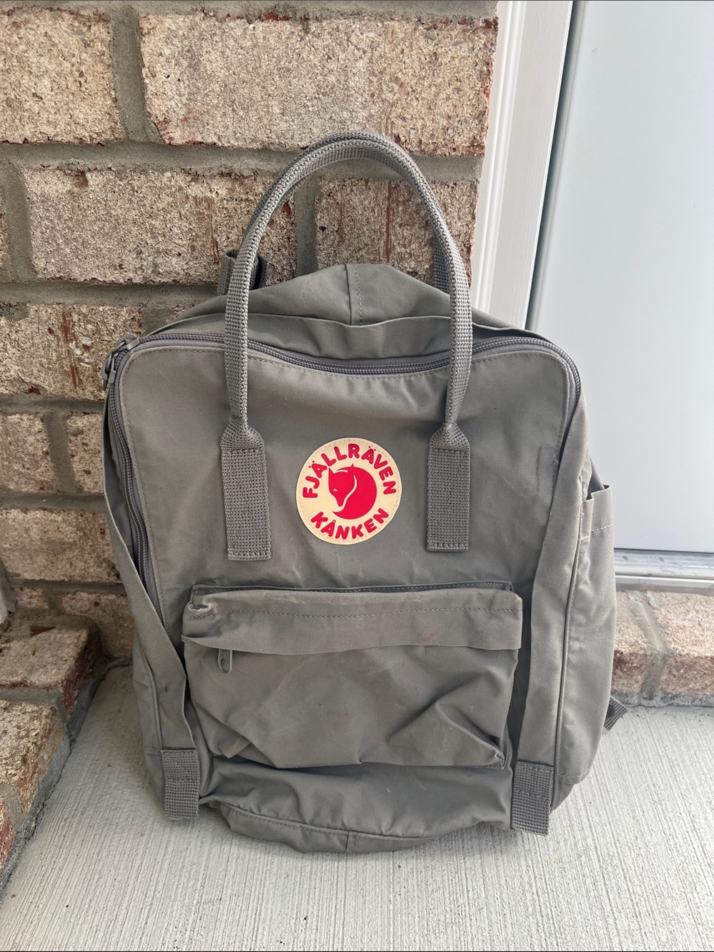 Fjallraven Kanken Backpack in Fog Gray with Red Fox Logo